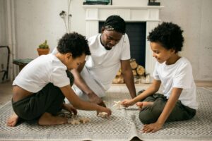 A father playing with his kids.